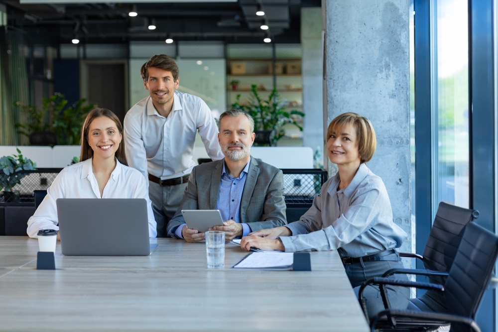 Group,Of,Positive,Successful,Modern,People,Sitting,In,Office,And